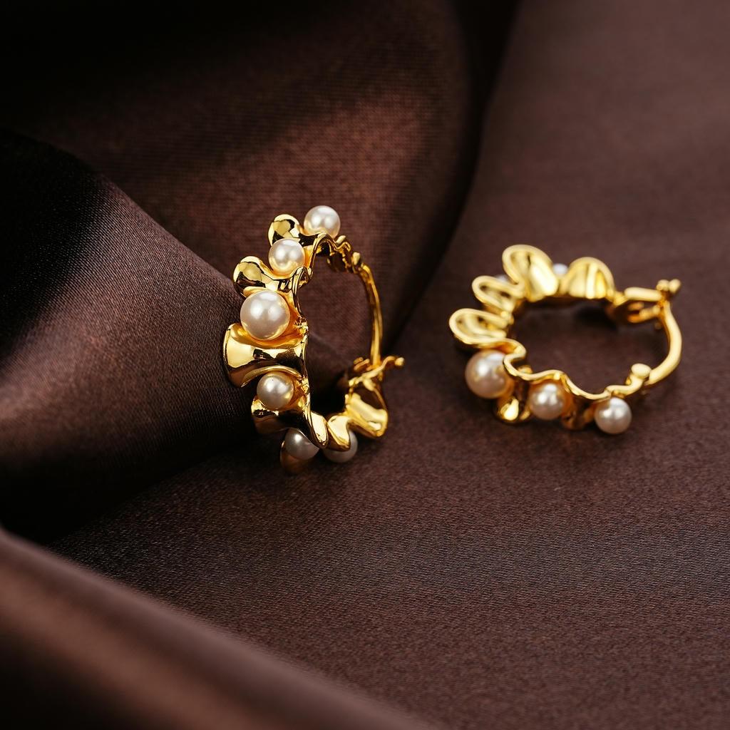 Wavy Pearl Huggie Earrings6