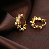 Wavy Pearl Huggie Earrings6